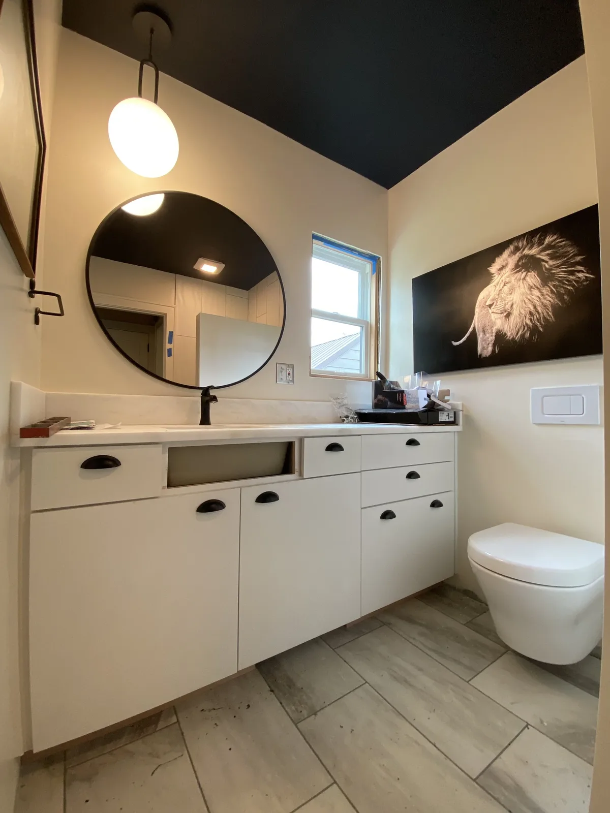 Designer powder room with wall-hung Toto toilet installed by Panda Plumbing
